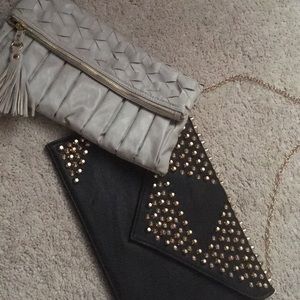 Two clutch bags, both with the option of a strap